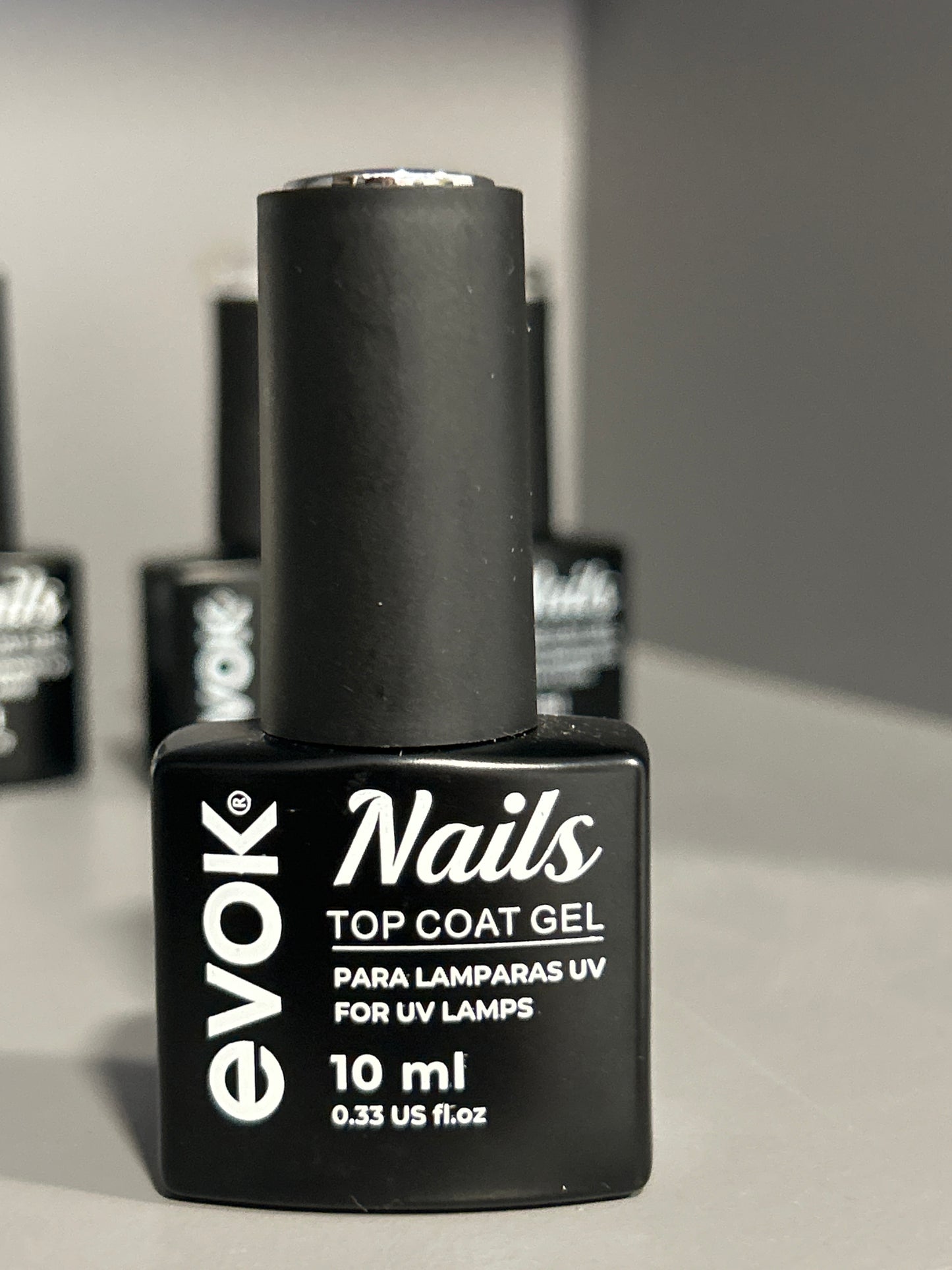 Top coat EVOK